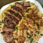 Camarones cajún y bistec Pasta Alfredo