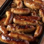 Salchichas, pimientos y cebollas